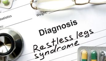 Zettel mit Aufschrift Diagnose Restless legs