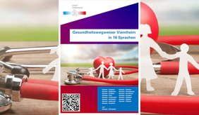Gesundheitswegweiser in 16 Sprachen ©Stadt Viernheim rotes Stethoskop auf Tisch im Vordergrund Deckblatt des Flyers mit Hinweistext auf Gesundheitswegweiser