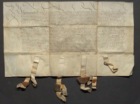 Die Urkunde zum Schiedsspruch des Pfalzgrafen Philipp in dem Streit Schönau gegen Viernheim aus dem Jahr 1503. ©Stadt Viernheim Urkundenpapier beschrieben